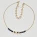 Handmade gold moon phase necklace with sapphire beads on bullion wire.